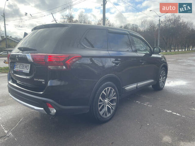 Чорний Міцубісі Аутлендер, об'ємом двигуна 2.36 л та пробігом 121 тис. км за 14700 $, фото 4 на Automoto.ua
