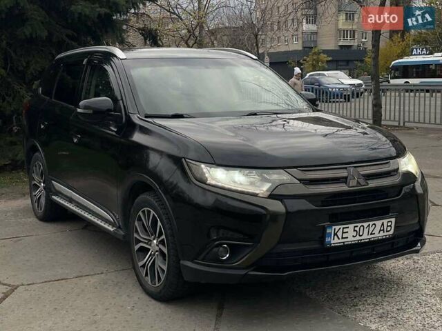 Черный Мицубиси Аутлендер, объемом двигателя 2.36 л и пробегом 167 тыс. км за 13500 $, фото 6 на Automoto.ua