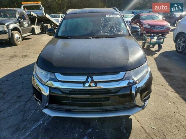 Чорний Міцубісі Аутлендер, об'ємом двигуна 2.36 л та пробігом 99 тис. км за 2100 $, фото 4 на Automoto.ua