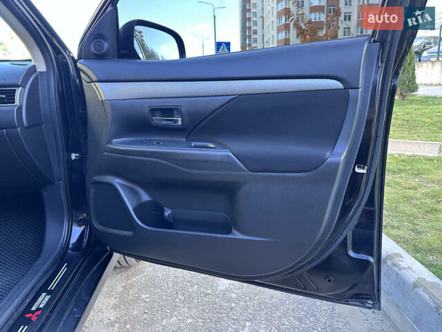 Черный Мицубиси Аутлендер, объемом двигателя 2.36 л и пробегом 150 тыс. км за 14900 $, фото 42 на Automoto.ua