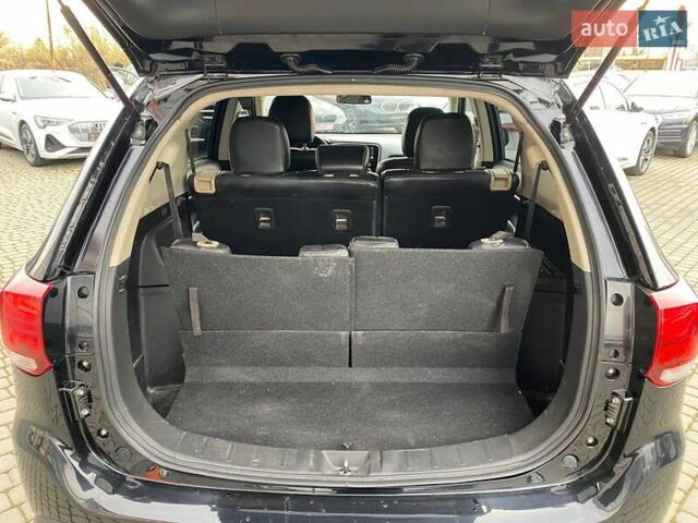 Черный Мицубиси Аутлендер, объемом двигателя 2.36 л и пробегом 143 тыс. км за 12900 $, фото 25 на Automoto.ua