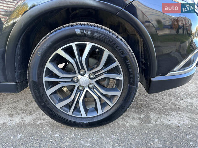 Черный Мицубиси Аутлендер, объемом двигателя 2.36 л и пробегом 150 тыс. км за 14900 $, фото 13 на Automoto.ua