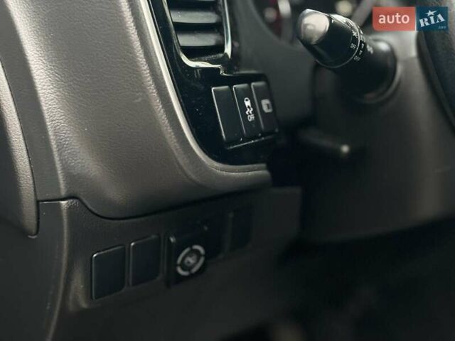 Черный Мицубиси Аутлендер, объемом двигателя 2.36 л и пробегом 167 тыс. км за 13500 $, фото 12 на Automoto.ua