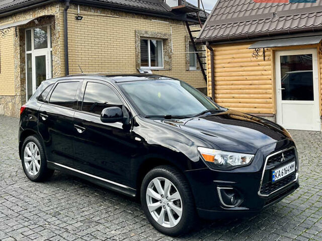 Чорний Міцубісі Аутлендер, об'ємом двигуна 2 л та пробігом 170 тис. км за 10999 $, фото 4 на Automoto.ua
