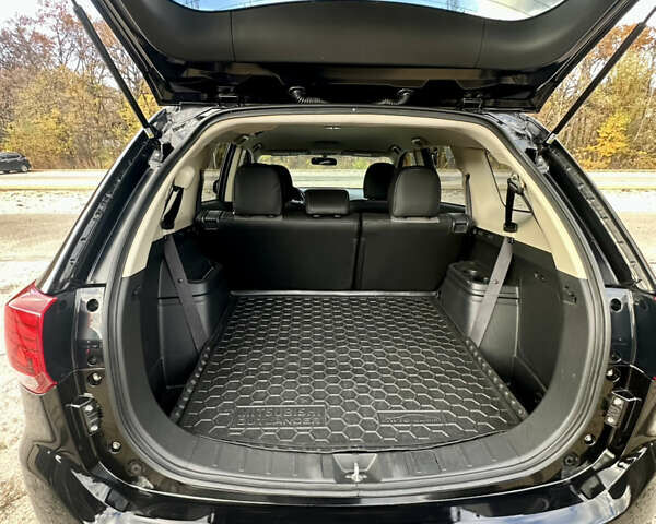 Черный Мицубиси Аутлендер, объемом двигателя 2.36 л и пробегом 119 тыс. км за 15600 $, фото 10 на Automoto.ua