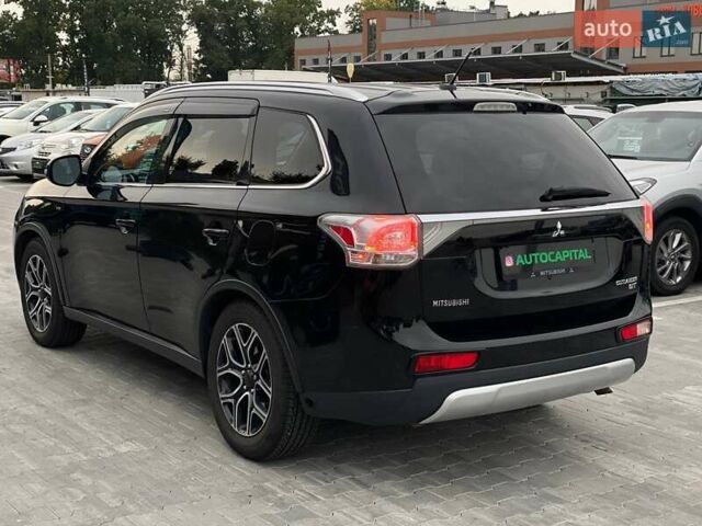 Черный Мицубиси Аутлендер, объемом двигателя 3 л и пробегом 146 тыс. км за 15990 $, фото 7 на Automoto.ua