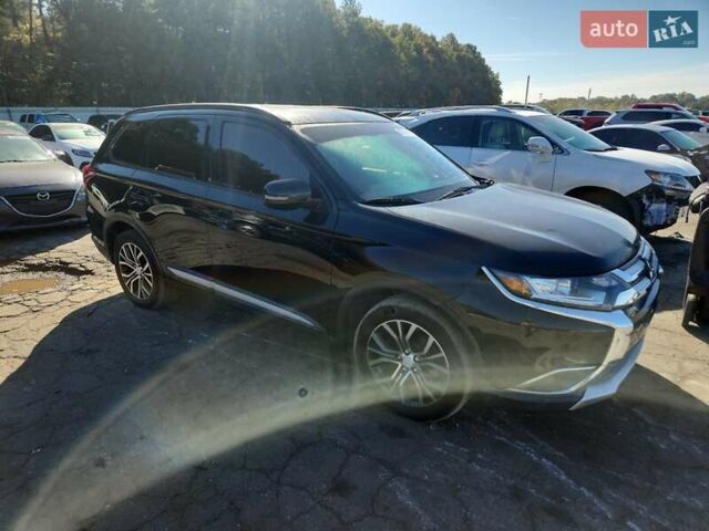 Чорний Міцубісі Аутлендер, об'ємом двигуна 2.36 л та пробігом 99 тис. км за 2100 $, фото 3 на Automoto.ua