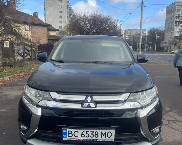 Чорний Міцубісі Аутлендер, об'ємом двигуна 2.36 л та пробігом 121 тис. км за 14700 $, фото 2 на Automoto.ua