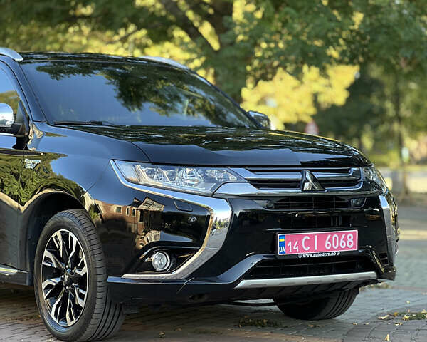 Чорний Міцубісі Аутлендер, об'ємом двигуна 2 л та пробігом 233 тис. км за 18000 $, фото 17 на Automoto.ua