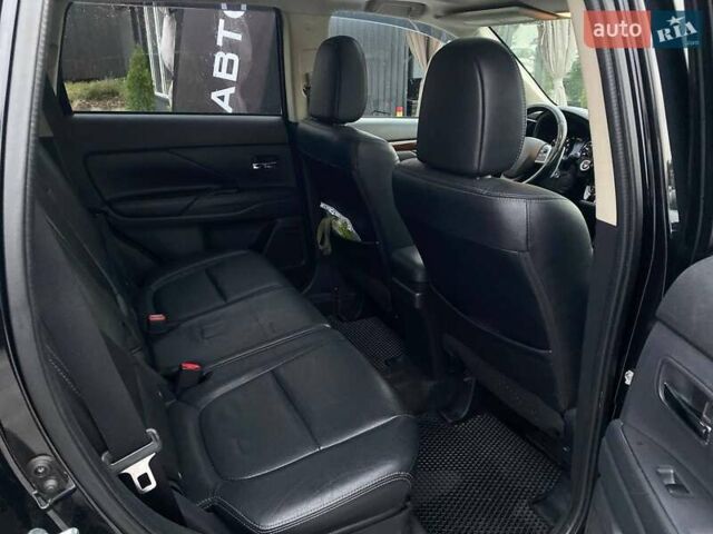 Черный Мицубиси Аутлендер, объемом двигателя 3 л и пробегом 146 тыс. км за 15990 $, фото 14 на Automoto.ua