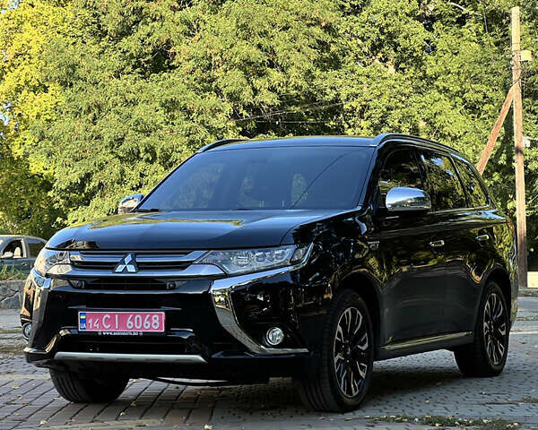 Чорний Міцубісі Аутлендер, об'ємом двигуна 2 л та пробігом 233 тис. км за 18000 $, фото 27 на Automoto.ua