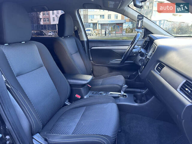 Черный Мицубиси Аутлендер, объемом двигателя 2.36 л и пробегом 150 тыс. км за 14900 $, фото 45 на Automoto.ua