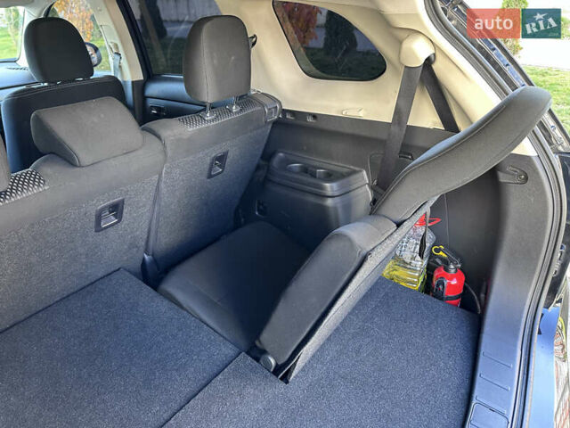 Черный Мицубиси Аутлендер, объемом двигателя 2.36 л и пробегом 150 тыс. км за 14900 $, фото 32 на Automoto.ua