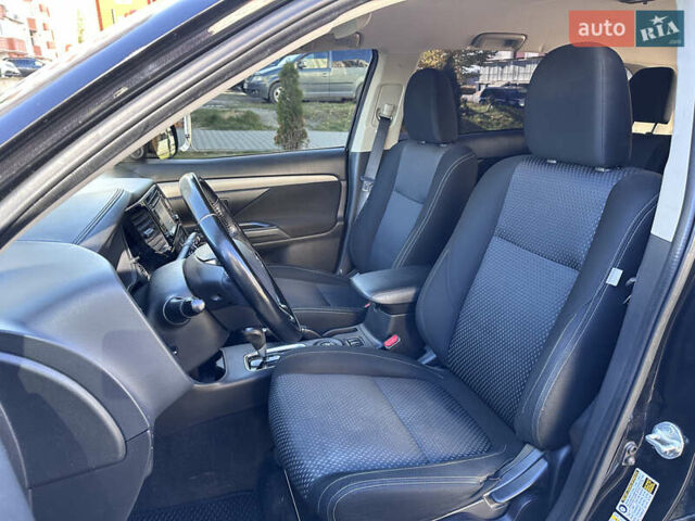 Черный Мицубиси Аутлендер, объемом двигателя 2.36 л и пробегом 150 тыс. км за 14900 $, фото 22 на Automoto.ua