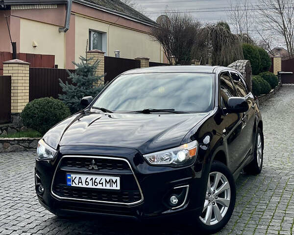 Чорний Міцубісі Аутлендер, об'ємом двигуна 2 л та пробігом 170 тис. км за 10999 $, фото 1 на Automoto.ua