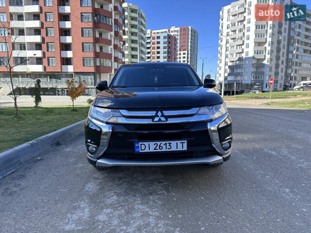 Черный Мицубиси Аутлендер, объемом двигателя 2.36 л и пробегом 150 тыс. км за 14900 $, фото 5 на Automoto.ua