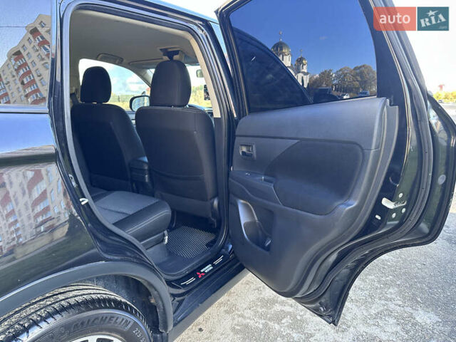 Черный Мицубиси Аутлендер, объемом двигателя 2.36 л и пробегом 150 тыс. км за 14900 $, фото 38 на Automoto.ua