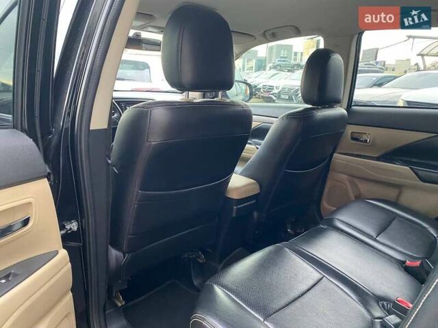Черный Мицубиси Аутлендер, объемом двигателя 2.36 л и пробегом 143 тыс. км за 12900 $, фото 20 на Automoto.ua