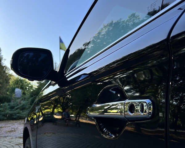 Чорний Міцубісі Аутлендер, об'ємом двигуна 2 л та пробігом 233 тис. км за 18000 $, фото 14 на Automoto.ua