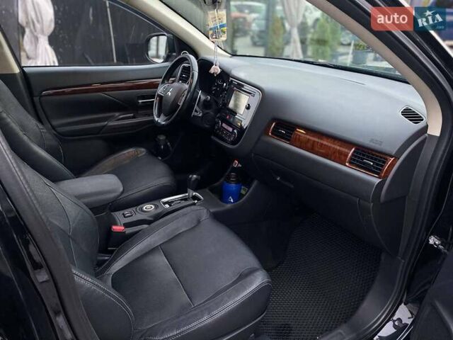 Черный Мицубиси Аутлендер, объемом двигателя 3 л и пробегом 146 тыс. км за 15990 $, фото 16 на Automoto.ua