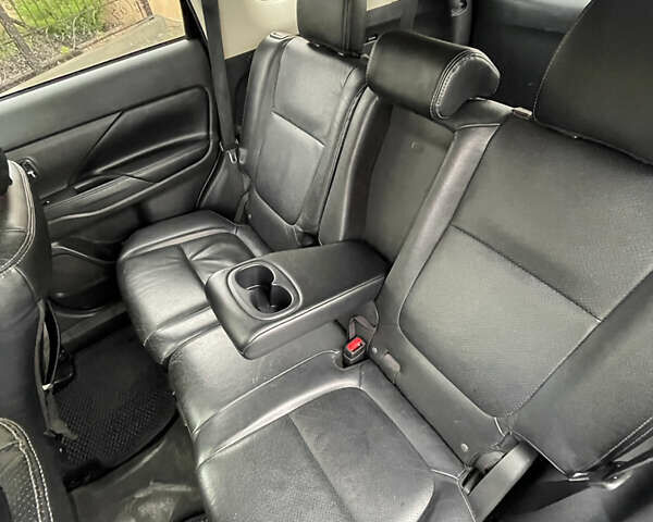 Черный Мицубиси Аутлендер, объемом двигателя 3 л и пробегом 257 тыс. км за 13699 $, фото 20 на Automoto.ua