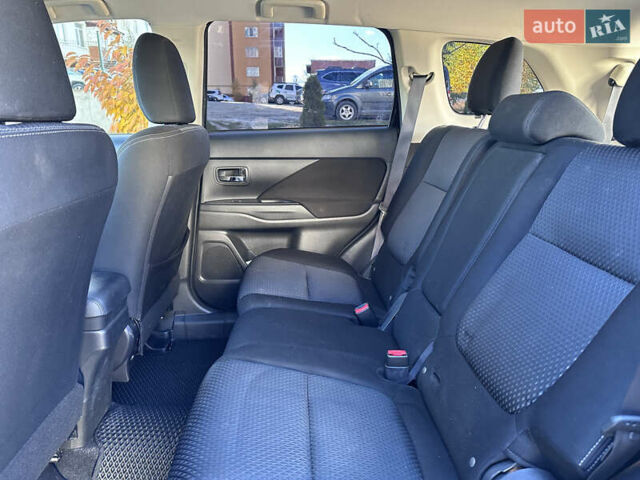 Черный Мицубиси Аутлендер, объемом двигателя 2.36 л и пробегом 150 тыс. км за 14900 $, фото 27 на Automoto.ua