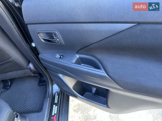 Черный Мицубиси Аутлендер, объемом двигателя 2.36 л и пробегом 150 тыс. км за 14900 $, фото 40 на Automoto.ua