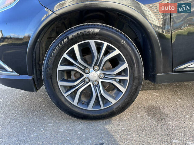 Черный Мицубиси Аутлендер, объемом двигателя 2.36 л и пробегом 150 тыс. км за 14900 $, фото 15 на Automoto.ua