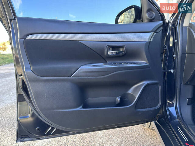 Черный Мицубиси Аутлендер, объемом двигателя 2.36 л и пробегом 150 тыс. км за 14900 $, фото 19 на Automoto.ua