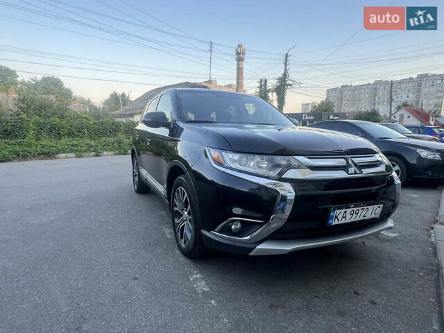 Чорний Міцубісі Аутлендер, об'ємом двигуна 2.35 л та пробігом 153 тис. км за 17800 $, фото 4 на Automoto.ua