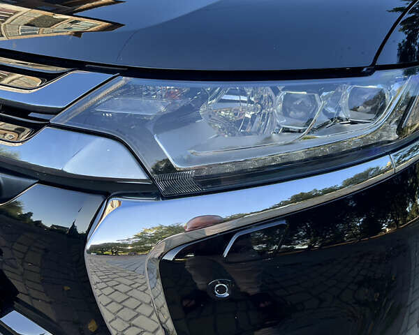 Чорний Міцубісі Аутлендер, об'ємом двигуна 2 л та пробігом 233 тис. км за 18000 $, фото 15 на Automoto.ua