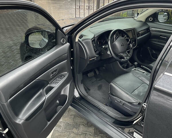 Черный Мицубиси Аутлендер, объемом двигателя 3 л и пробегом 257 тыс. км за 13699 $, фото 25 на Automoto.ua