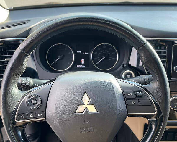 Черный Мицубиси Аутлендер, объемом двигателя 2.36 л и пробегом 91 тыс. км за 15500 $, фото 14 на Automoto.ua