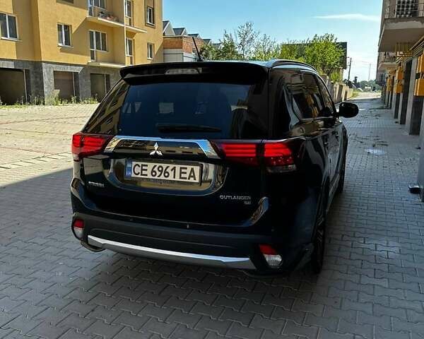 Чорний Міцубісі Аутлендер, об'ємом двигуна 2.36 л та пробігом 225 тис. км за 13699 $, фото 8 на Automoto.ua