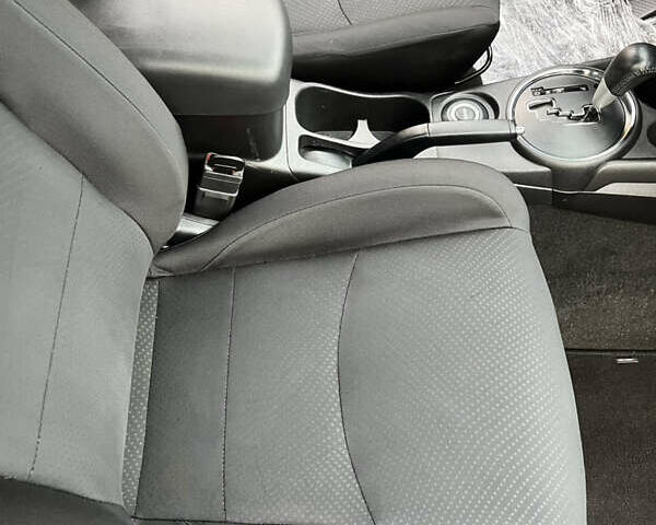 Чорний Міцубісі Аутлендер, об'ємом двигуна 2 л та пробігом 170 тис. км за 10999 $, фото 29 на Automoto.ua