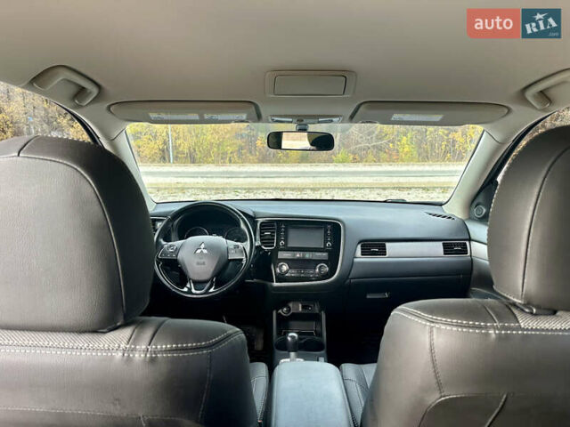 Черный Мицубиси Аутлендер, объемом двигателя 2.36 л и пробегом 119 тыс. км за 15600 $, фото 6 на Automoto.ua