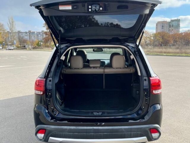 Черный Мицубиси Аутлендер, объемом двигателя 2.4 л и пробегом 91 тыс. км за 15500 $, фото 2 на Automoto.ua