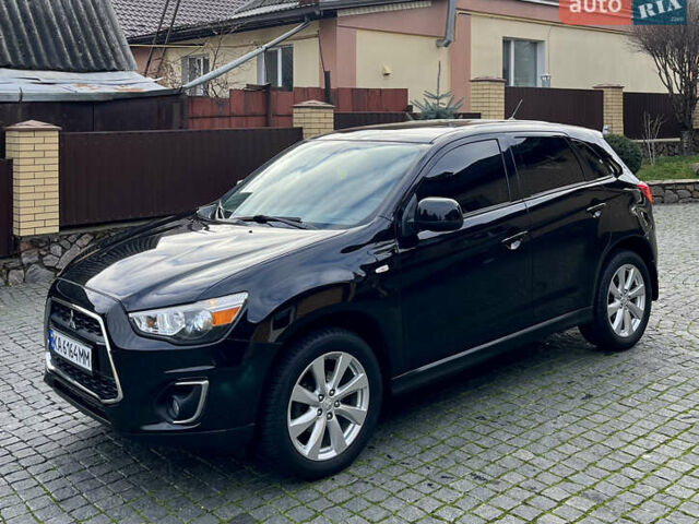 Чорний Міцубісі Аутлендер, об'ємом двигуна 2 л та пробігом 170 тис. км за 10999 $, фото 5 на Automoto.ua