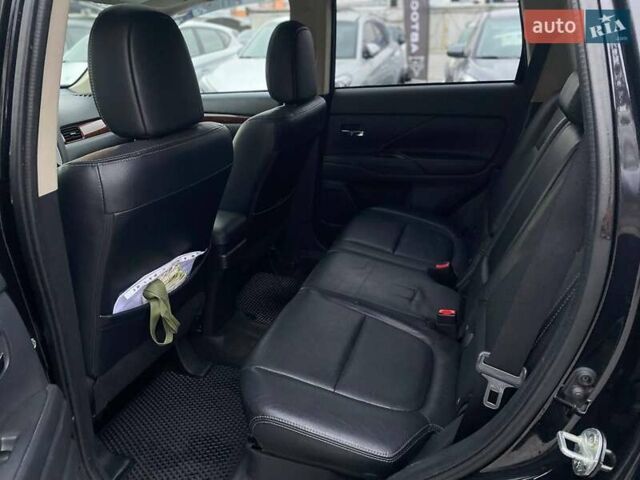 Черный Мицубиси Аутлендер, объемом двигателя 3 л и пробегом 146 тыс. км за 15990 $, фото 12 на Automoto.ua