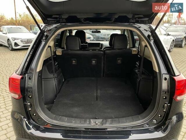 Черный Мицубиси Аутлендер, объемом двигателя 2.36 л и пробегом 143 тыс. км за 12900 $, фото 26 на Automoto.ua