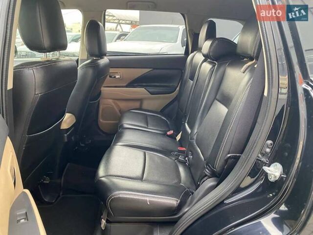 Черный Мицубиси Аутлендер, объемом двигателя 2.36 л и пробегом 143 тыс. км за 12900 $, фото 19 на Automoto.ua