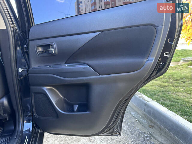 Черный Мицубиси Аутлендер, объемом двигателя 2.36 л и пробегом 150 тыс. км за 14900 $, фото 39 на Automoto.ua