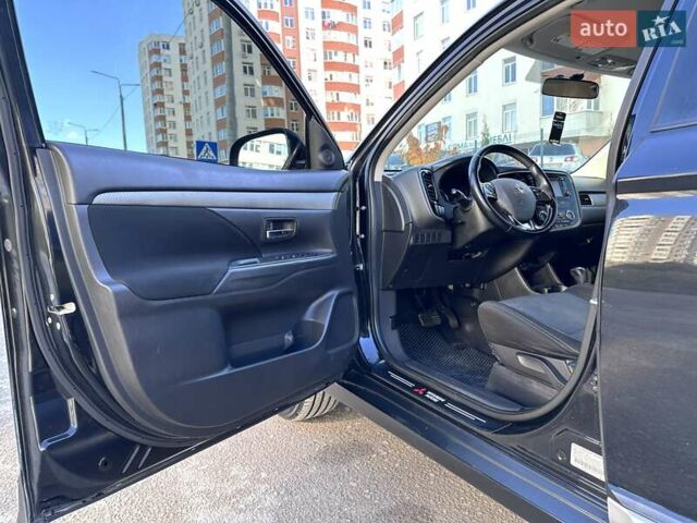 Черный Мицубиси Аутлендер, объемом двигателя 2.36 л и пробегом 150 тыс. км за 14900 $, фото 18 на Automoto.ua