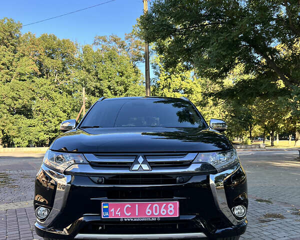 Чорний Міцубісі Аутлендер, об'ємом двигуна 2 л та пробігом 233 тис. км за 18000 $, фото 24 на Automoto.ua