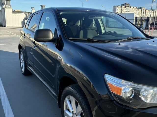 Черный Мицубиси Аутлендер, объемом двигателя 2 л и пробегом 105 тыс. км за 9999 $, фото 2 на Automoto.ua