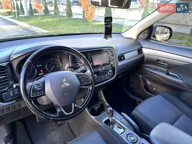 Черный Мицубиси Аутлендер, объемом двигателя 2.36 л и пробегом 150 тыс. км за 14900 $, фото 23 на Automoto.ua