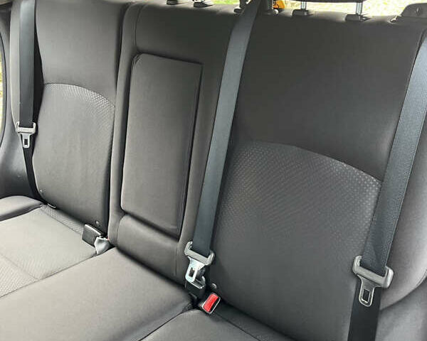 Чорний Міцубісі Аутлендер, об'ємом двигуна 2 л та пробігом 170 тис. км за 10999 $, фото 25 на Automoto.ua