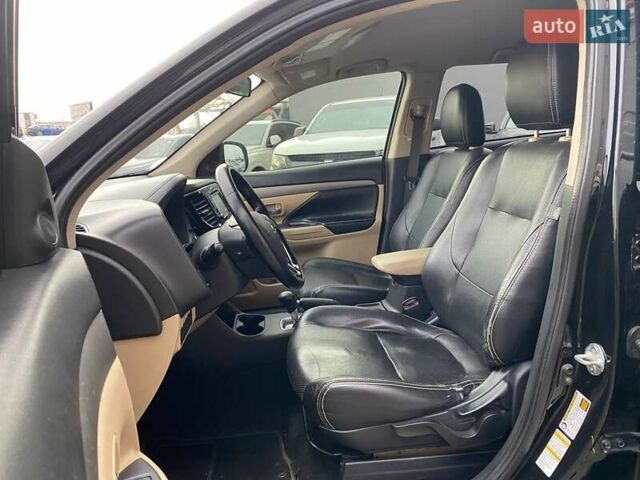 Черный Мицубиси Аутлендер, объемом двигателя 2.36 л и пробегом 143 тыс. км за 12900 $, фото 17 на Automoto.ua