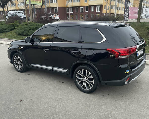 Черный Мицубиси Аутлендер, объемом двигателя 3 л и пробегом 260 тыс. км за 13799 $, фото 3 на Automoto.ua