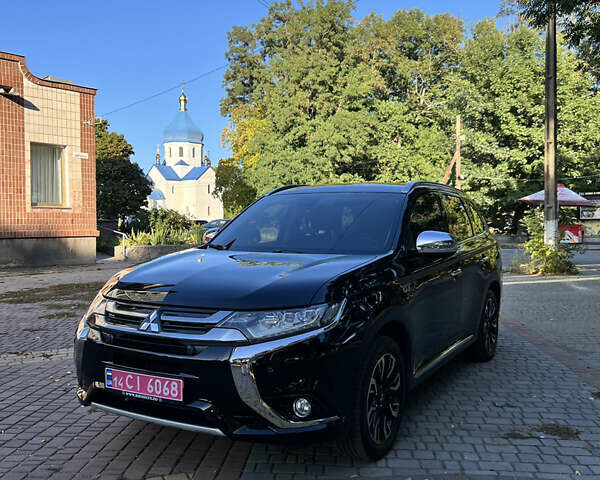 Чорний Міцубісі Аутлендер, об'ємом двигуна 2 л та пробігом 233 тис. км за 18000 $, фото 23 на Automoto.ua